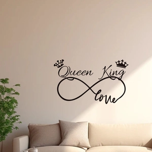 Detail of King and Queen infinity love wall sticker in black vinyl above a sofa