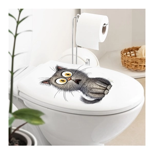 Funny scared grey cat sticker on white toilet lid with bright bathroom background scene