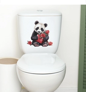 Close-up of cute panda sticker with red rose and heart box on white toilet tank