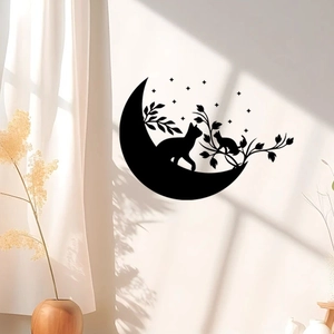 Detail of black cat and moon silhouette wall sticker on a minimalist bedroom wall