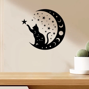 Detail view of black cat silhouette wall sticker on moon with stars for home decor