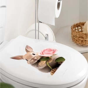 3D Easter bunny decal with pink roses on a white toilet lid in a cozy bathroom setting