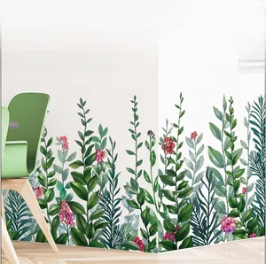 Sticker mural détaillé avec plantes vertes et baies rouges pour décoration de maison