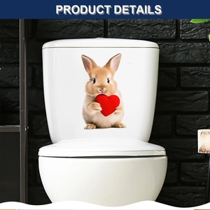 Detailed view of a cute bunny wall sticker with red heart on a white toilet lid