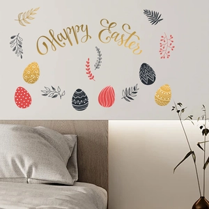 Detailed close-up of golden Happy Easter wall decals with colorful egg patterns in a bedroom