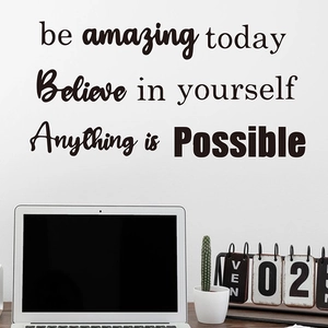 Detail showing motivational quotes be amazing today and believe in yourself on office wall