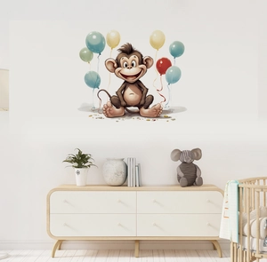 Detailed view of cartoon monkey wall decals with colorful balloons in a nursery setting