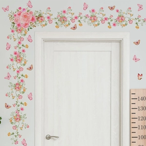 Floral wall stickers with pink roses and colorful butterflies on white door frame décor