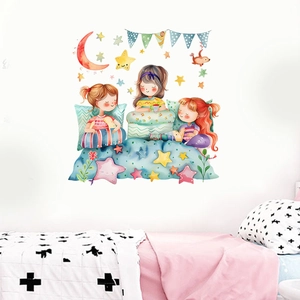 Nursery wall sticker detail showing three sisters sleeping under stars and moon