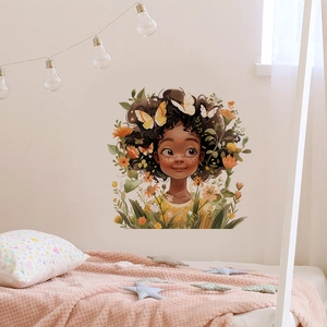 Detail of cartoon girl wall sticker with flowers and butterflies in a cozy bedroom