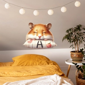 Detail of cute hamster wall sticker on a pillow with letter A and heart decor