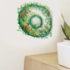 Detail of floral wreath wall sticker with colorful flowers on a clean white wall decor