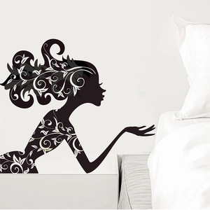 Minimalist female silhouette wall sticker with floral accents for bedroom decor