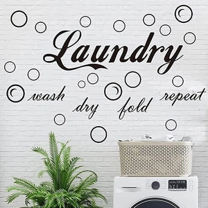 Laundry wall sticker with wash dry fold repeat quote on white brick wall background
