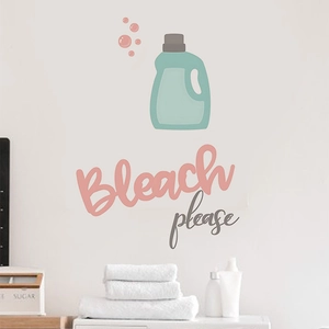 Detail of Bleach please cartoon wall sticker applied on a clean white laundry room wall