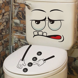 Detail of waterproof PVC cartoon toilet stickers with face and hand icons on white seat