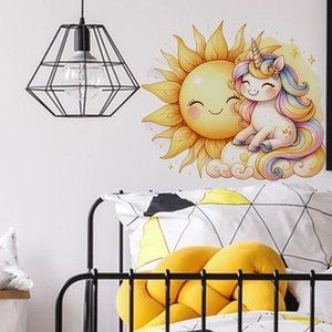 Detailed view of cartoon unicorn and sun wall decal on a minimalist bedroom wall