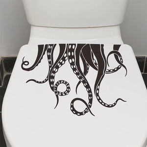 Creative black octopus tentacle sticker on white toilet lid for bathroom decor