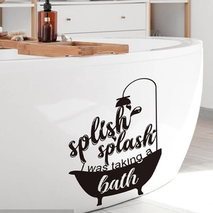 Waterproof bathtub wall sticker with 'splish splash' text on white bath side