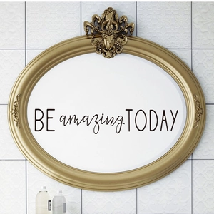 Close-up of BE amazing TODAY wall decal on an elegant vintage gold mirror frame