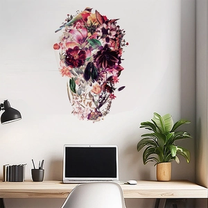 Floral skull wall sticker with colorful birds and flowers in a cozy office setting