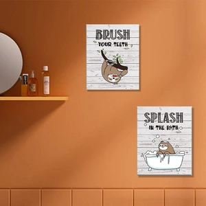 Detail of two cute cartoon sloth wall stickers for bathroom with fun slogans