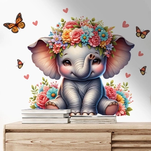 Détail d'un autocollant mural éléphant 3D avec fleurs et papillons pour chambre d'enfant