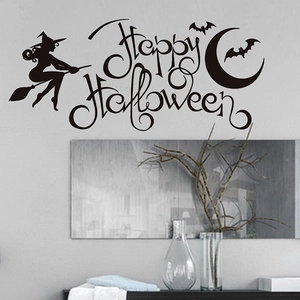 Detail of Happy Halloween wall decal featuring a witch silhouette and bats on a wall
