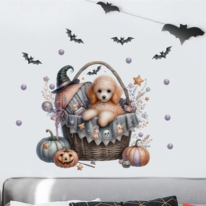 Detail of Halloween wall sticker with puppy in basket, pumpkins and bats on white wall