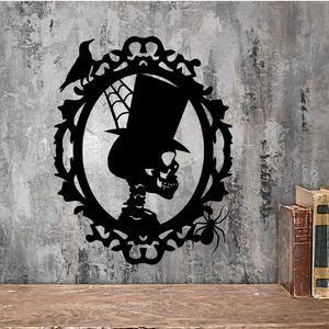 Gothic Halloween wall decor featuring a skull portrait within a vintage frame with spiders
