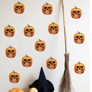 Detailed view of 12 pumpkin skull wall stickers arranged on a white festive wall surface