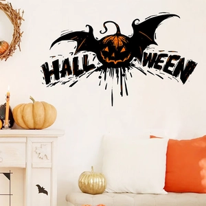 Halloween pumpkin wall sticker with bat wings and festive home decor on a fireplace