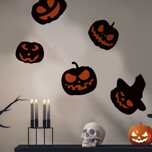 Detail of Halloween pumpkin wall stickers with Jack-o'-lantern designs and a wizard hat