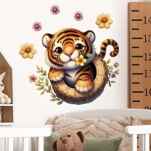 Detail of cute cartoon tiger in a tree hollow wall sticker for kids' room decoration