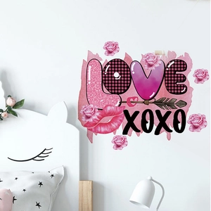 Romantic pink rose and LOVE letter wall stickers applied on a cozy bedroom wall
