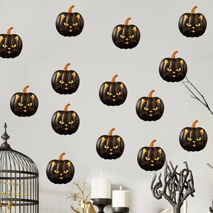 Black cat pumpkin wall stickers arranged on a grey wall with spooky Halloween decor