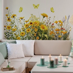 Detail of sunflower and butterfly wall stickers applied on living room wall