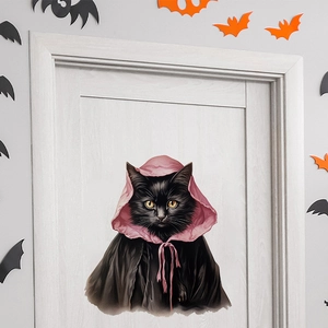 Detailed wall sticker showing a black cat in a pink hooded cloak for Halloween decor