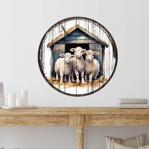 Farmhouse style round wooden wall art featuring three sheep and a blue barn design