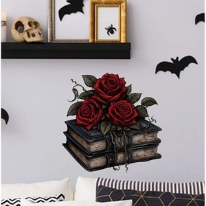 Gothic wall sticker detail with red roses on old books and bat Halloween decor