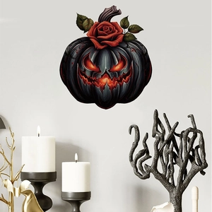 Detail of Halloween wall sticker with spooky pumpkin and red rose in a gothic home setting