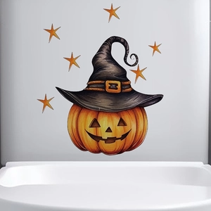 Dettaglio adesivo zucca di Halloween con cappello da mago e stelle su superficie bianca
