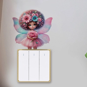 Detailed view of fairy wall sticker with butterfly wings on a light grey wall over a switch
