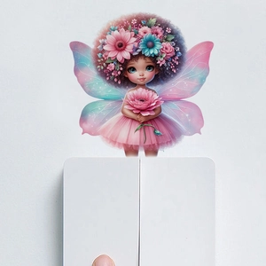 Detail view of fairy wall sticker with flower headwear and wings on white switch panel