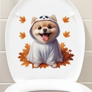 Detail of a Halloween ghost puppy and maple leaf sticker applied on a white toilet lid