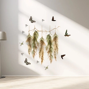Detail of hanging dried plants and flying butterflies wall decals in a modern sunlit room