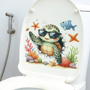 Sticker 3D tortue marine avec décor océanique appliqué sur un abattant de toilette