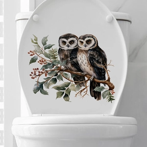 Watercolor owl wall decals on a white toilet lid featuring autumn branches and berries
