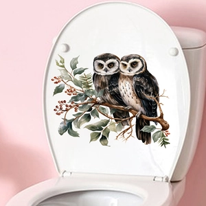 Watercolor owls with green leaves and red berries on a self-adhesive toilet sticker decal