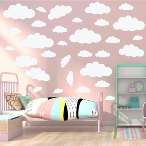 White minimalist cloud wall stickers in various sizes for cozy nursery room decoration